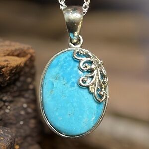 NK Vintage Artisan Turquoise Sterling Silver Oval Pendant With Scroll Design
